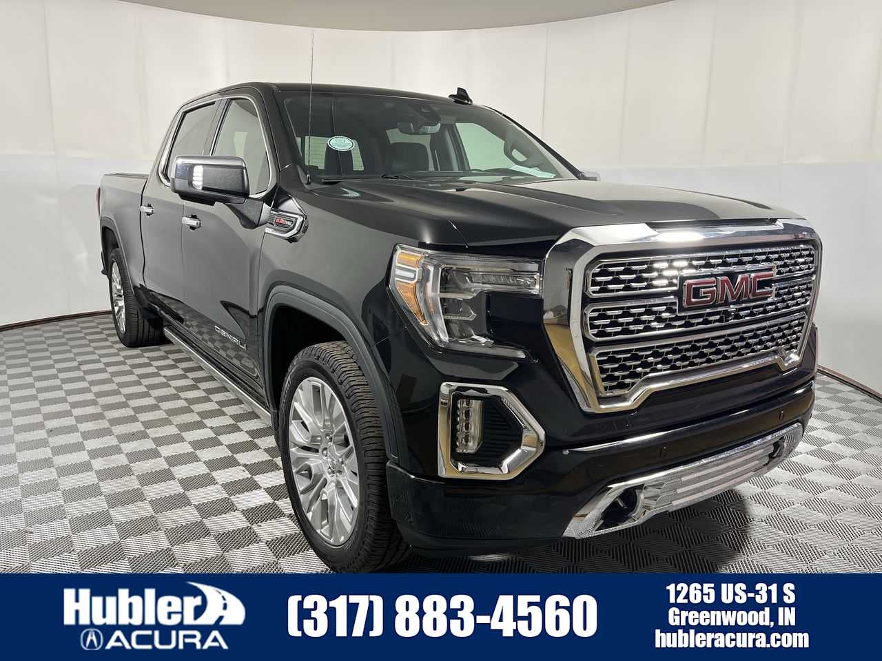2021 GMC Sierra 1500 Denali in Onyx Black — front three-quarter view