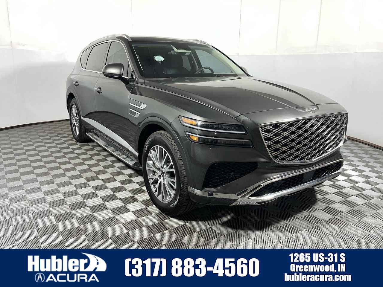 2025 Genesis GV80 2.5T in Makalu Gray — front three-quarter view