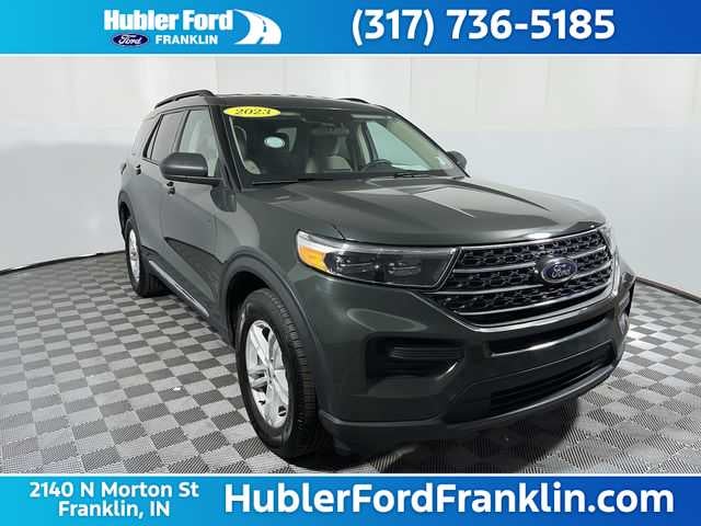 2023 Ford Explorer XLT in Forged Green — front three-quarter view