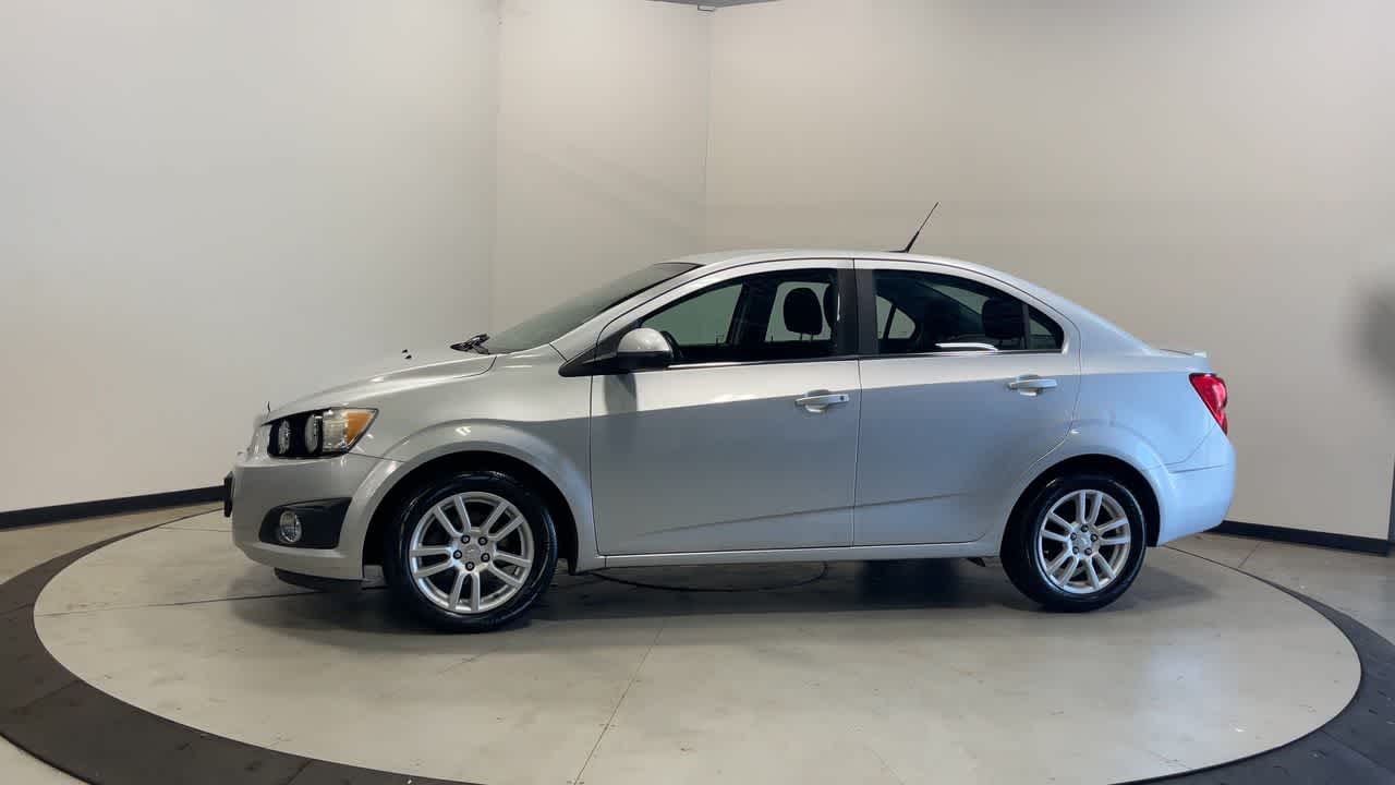 2013 Chevrolet Sonic — rear three-quarter view