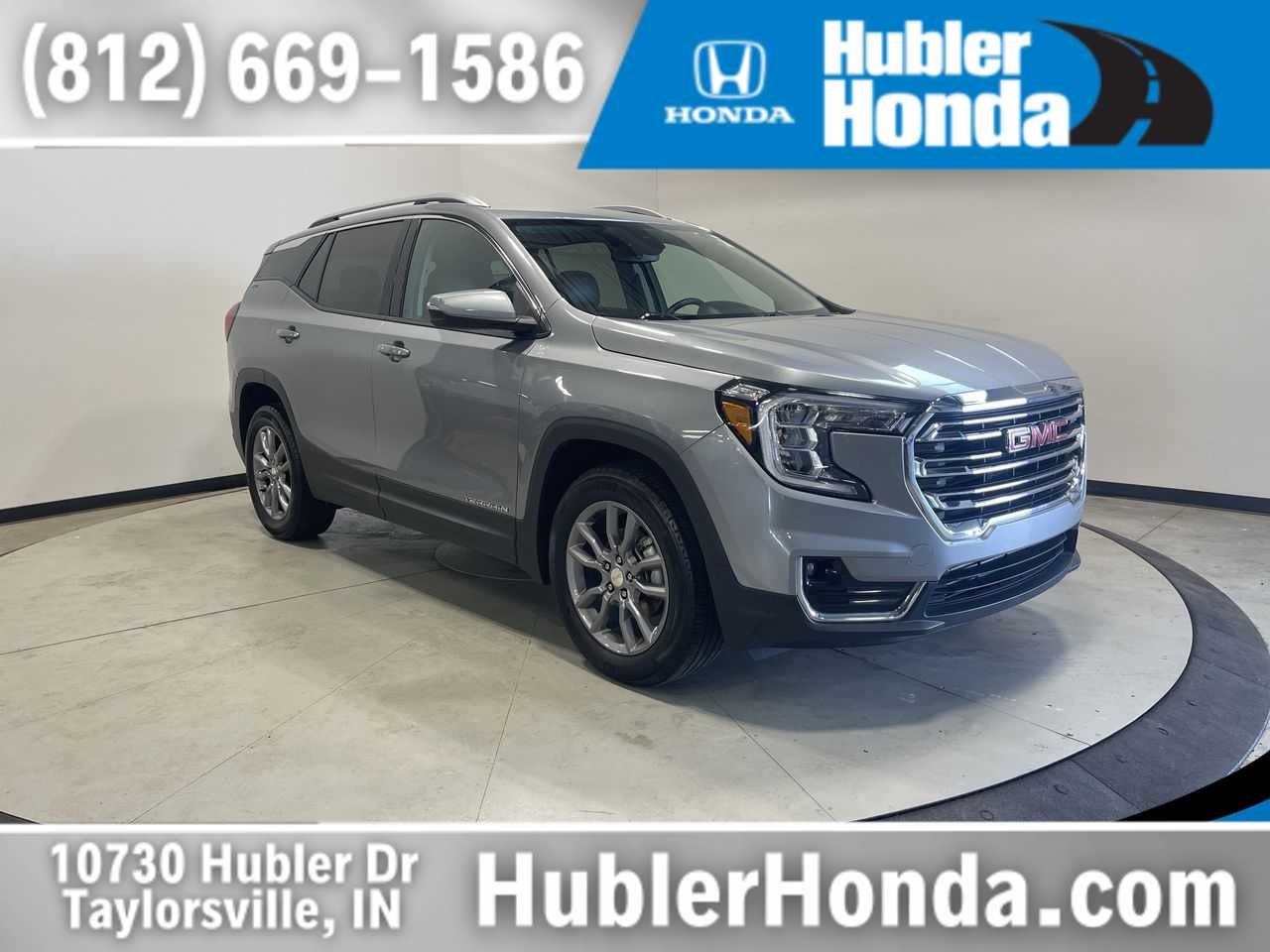 2024 GMC Terrain SLT in Sterling Metallic — front three-quarter view