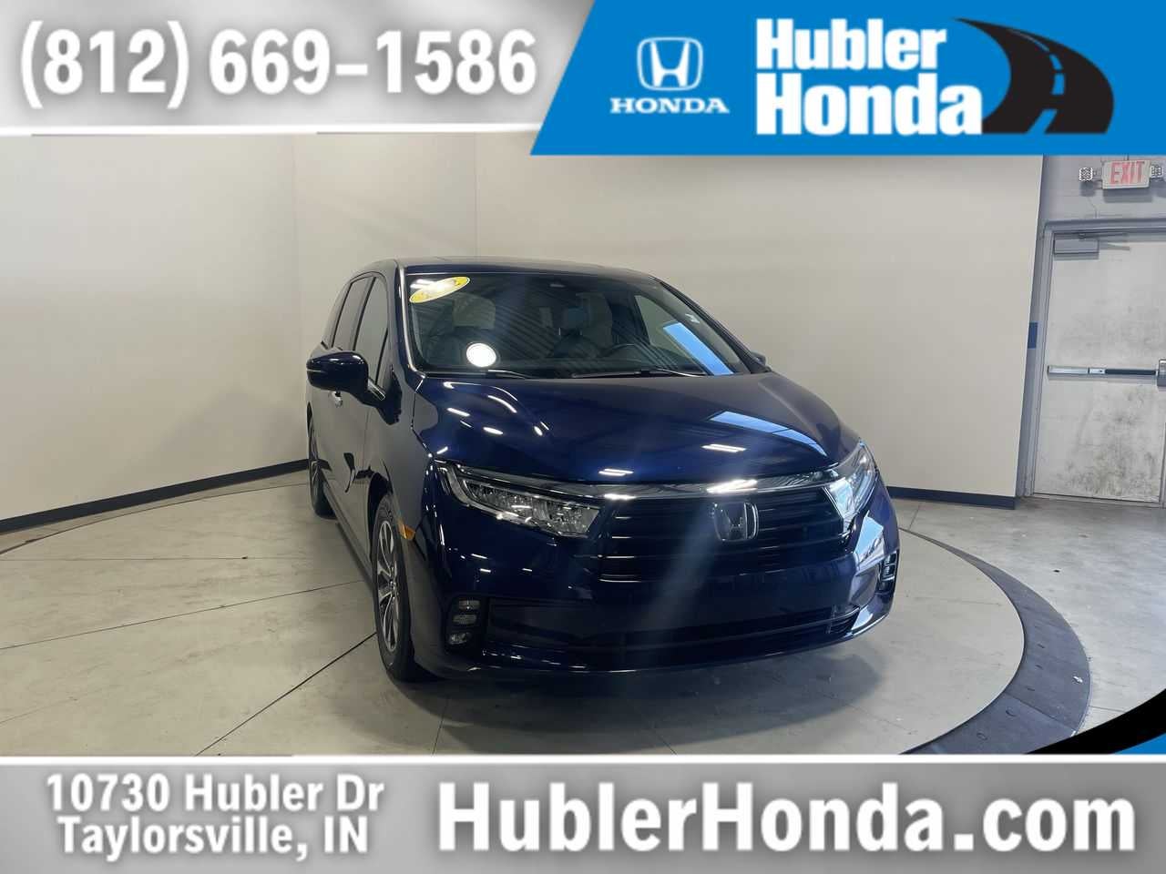 2022 Honda Odyssey EX-L in Obsidian Blue Pearl — front three-quarter view