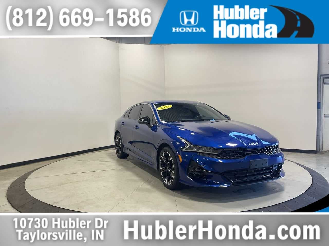 2022 Kia K5 GT-Line in Sapphire Blue — front three-quarter view