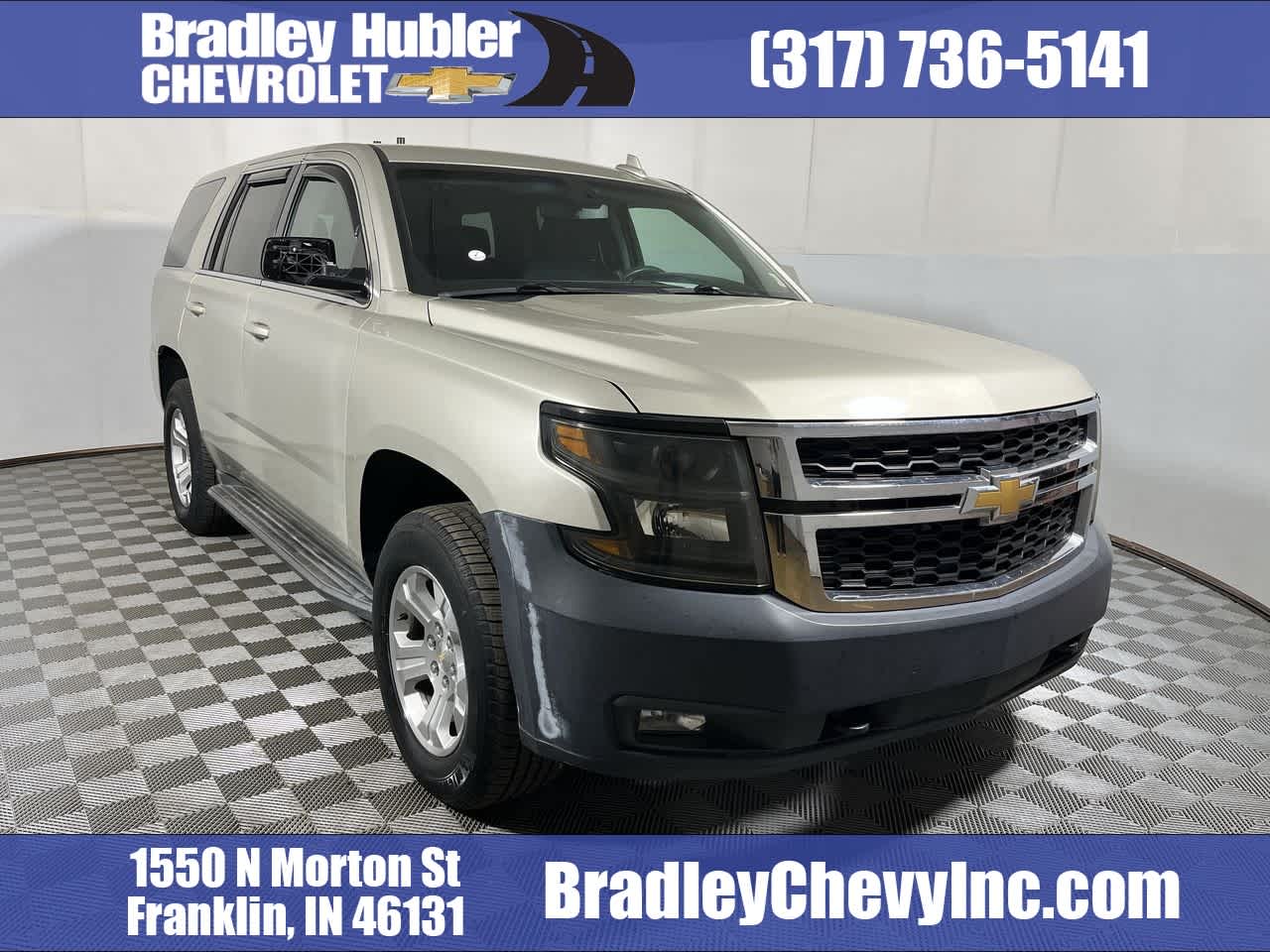 2015 Chevrolet Tahoe Commercial in Champagne Silver Metallic — front three-quarter view