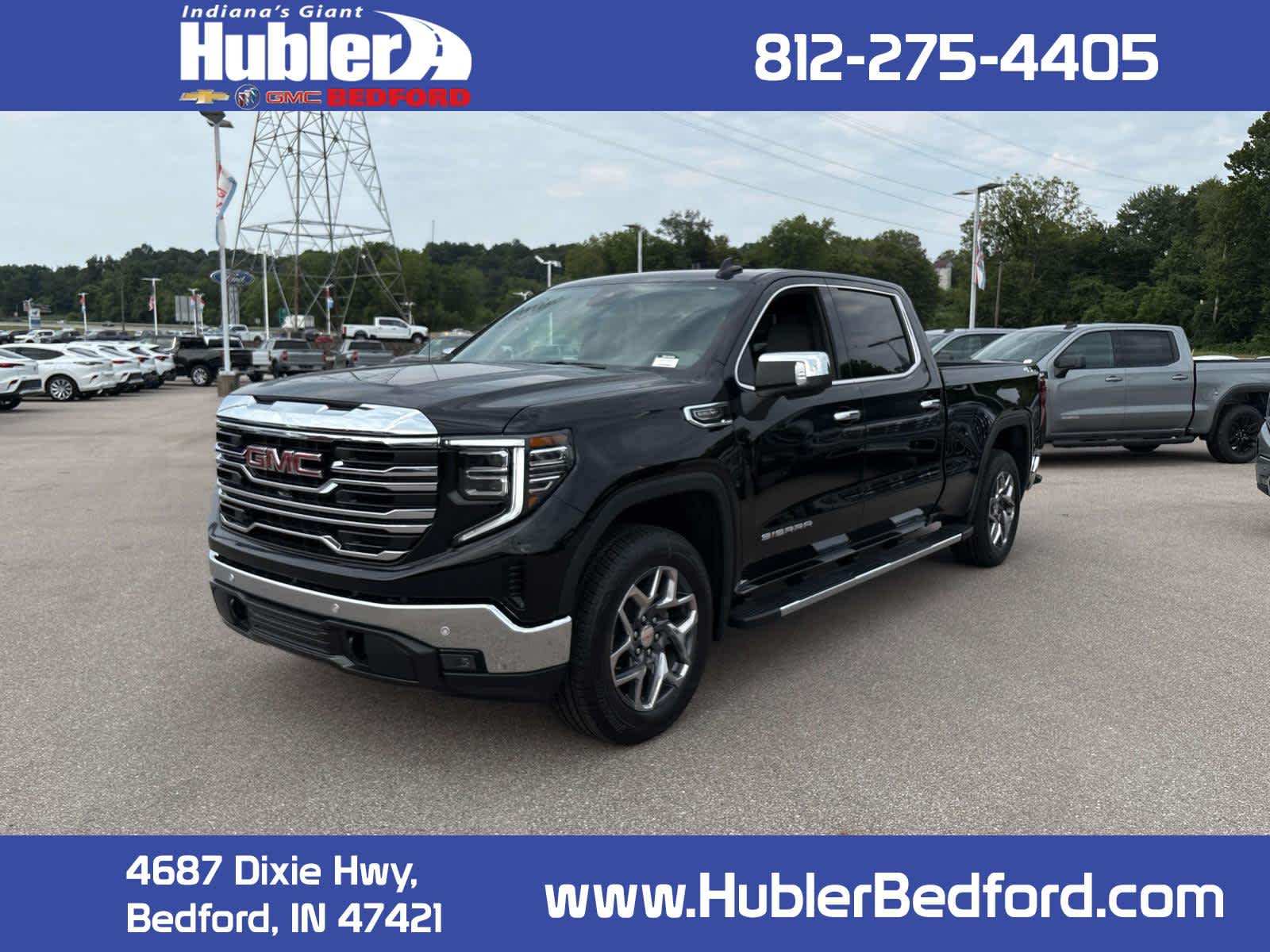 2026 GMC Sierra 1500 SLT in Onyx Black — front three-quarter view