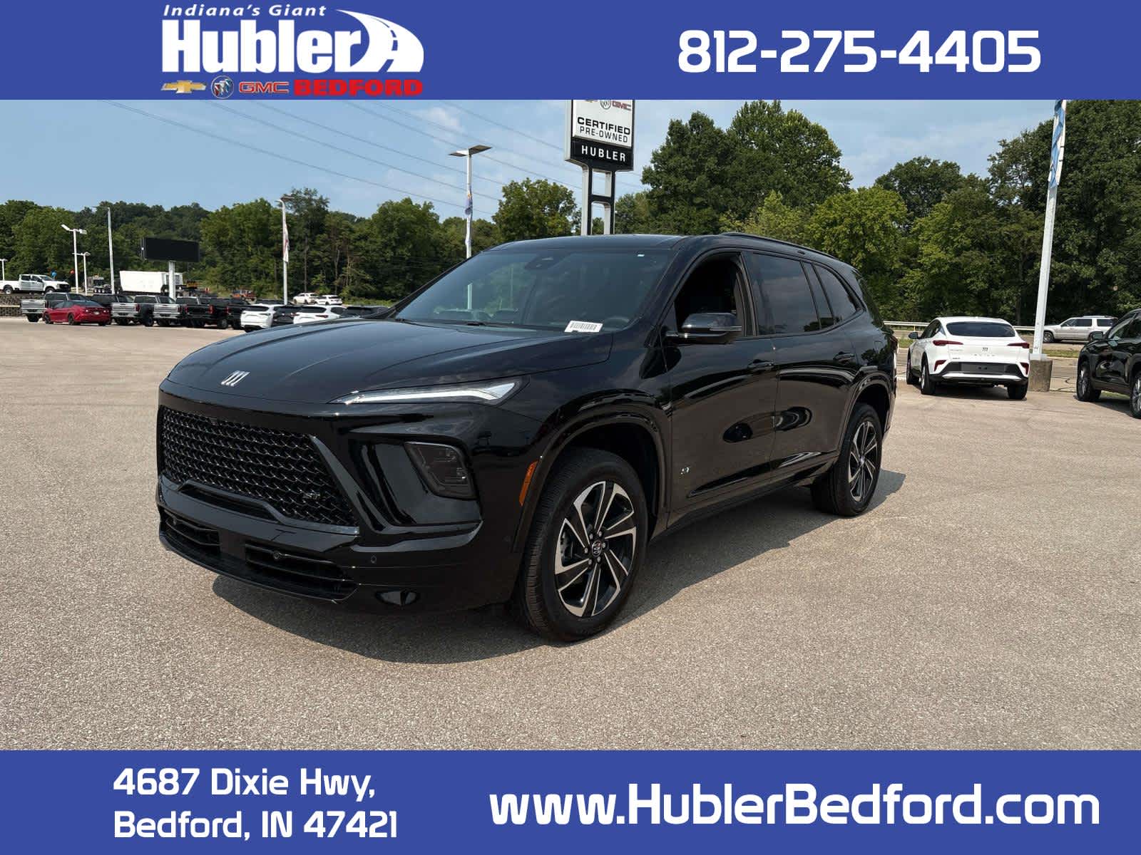 2026 Buick Enclave Sport Touring in Ebony Twilight Metallic — front three-quarter view