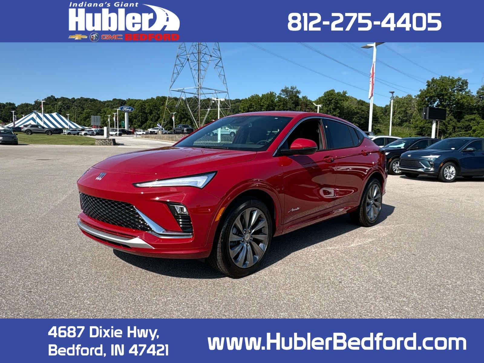 2026 Buick Envista Avenir in Brilliant Red — front three-quarter view