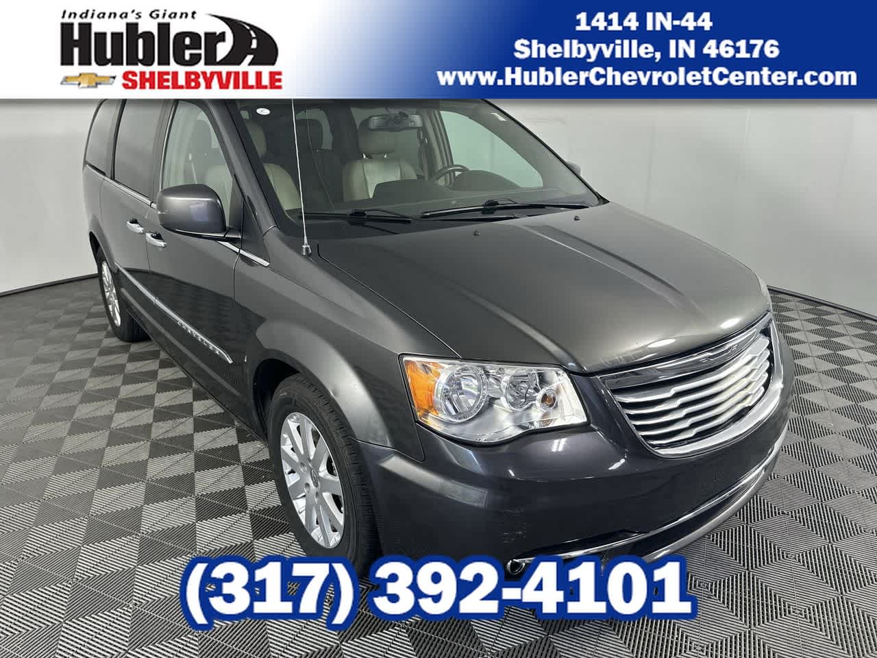 2016 Chrysler Town & Country Touring in Black — front three-quarter view