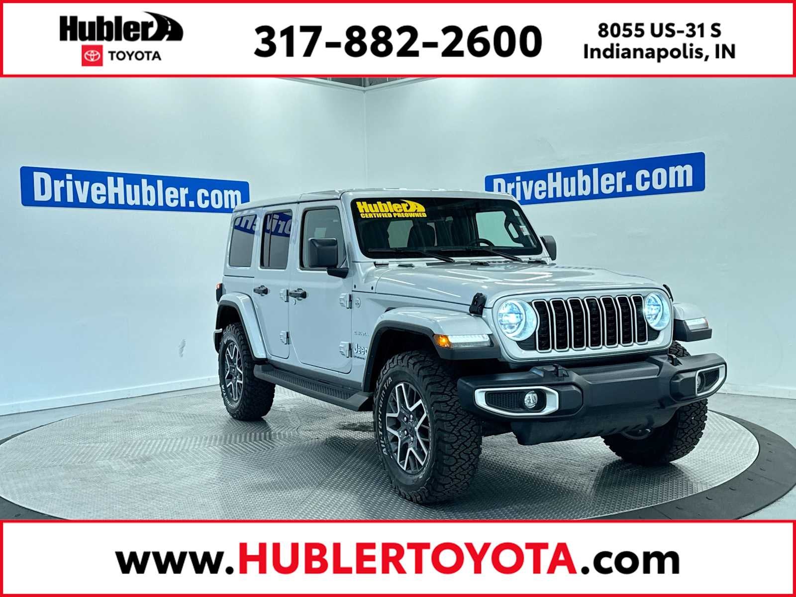 2024 Jeep Wrangler Sahara in Silver Zynith Clearcoat — front three-quarter view