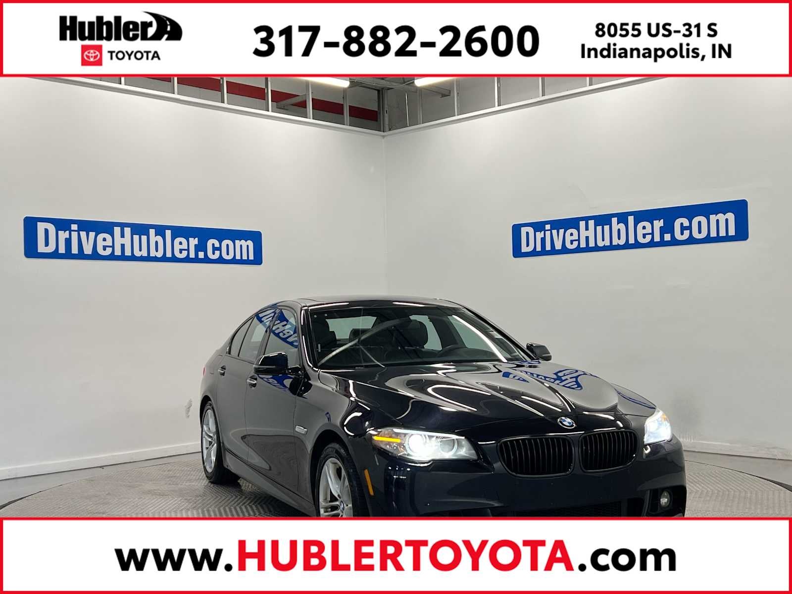 2016 BMW 528i xDrive 528i xDrive in Jet Black — front three-quarter view