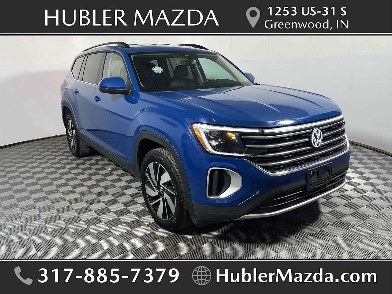 2026 Volkswagen Atlas 2.0T SE w/Technology in Mountain Lake Blue Metallic — front three-quarter view