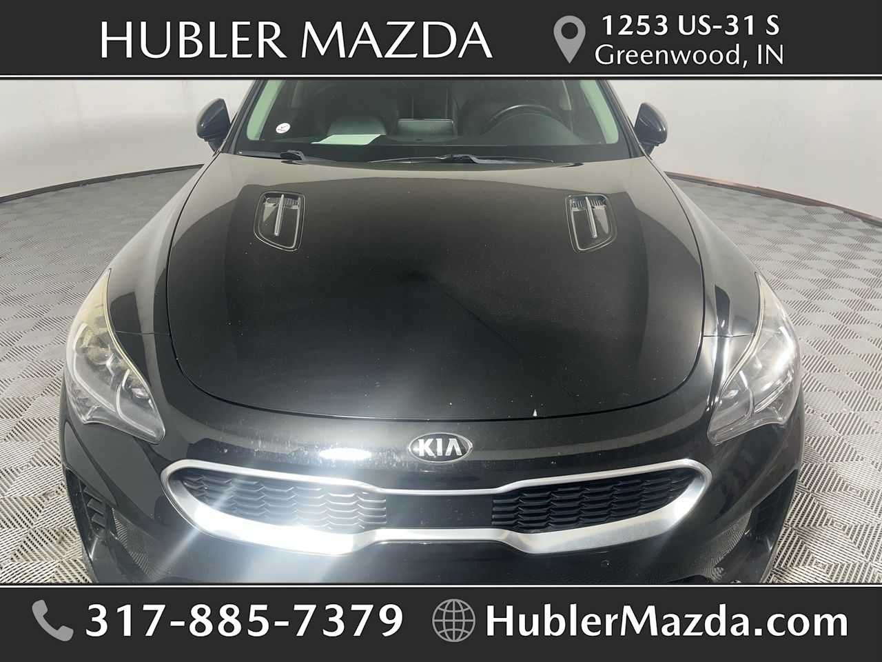 2018 Kia Stinger Premium in Aurora Black — front three-quarter view