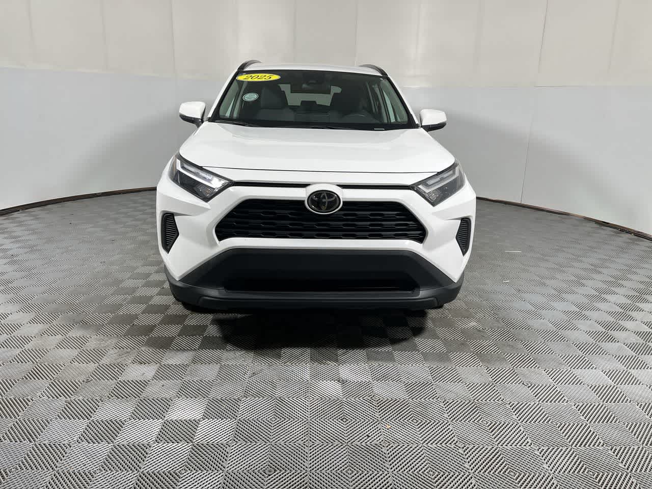 2025 Toyota RAV4 — rear three-quarter view