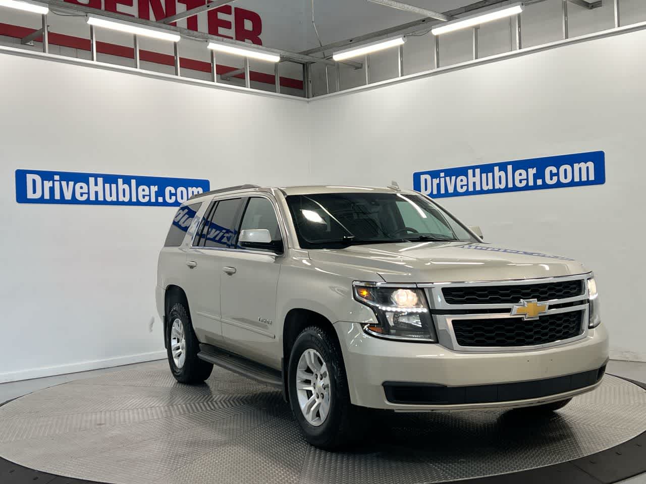 2016 Chevrolet Tahoe LS in Champagne Silver Metallic — front three-quarter view
