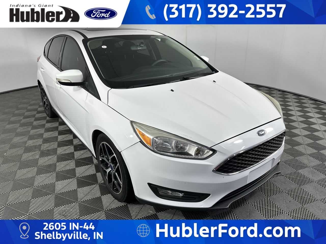 2017 Ford Focus SEL in Oxford White — front three-quarter view
